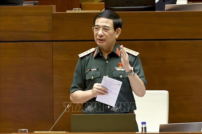 Đại tướng Phan Văn Giang, Bộ trưởng Bộ Quốc phòng phát biểu giải trình, làm rõ một số vấn đề đại biểu Quốc hội nêu. Ảnh: Doãn Tấn - TTXVN