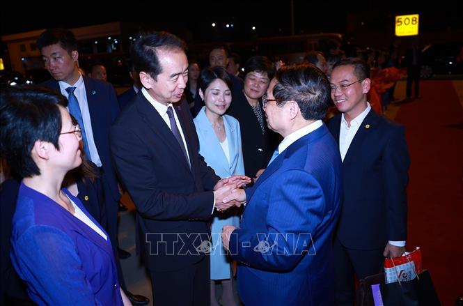 Lễ tiễn Thủ tướng Phạm Minh Chính kết thúc chuyến tham dự Hội nghị WEF 16 Thiên Tân và làm việc tại Trung Quốc. Ảnh: Dương Giang-TTXVN