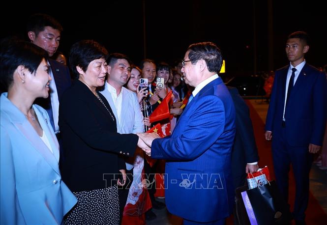 Lễ tiễn Thủ tướng Phạm Minh Chính kết thúc chuyến tham dự Hội nghị WEF 16 Thiên Tân và làm việc tại Trung Quốc. Ảnh: Dương Giang-TTXVN