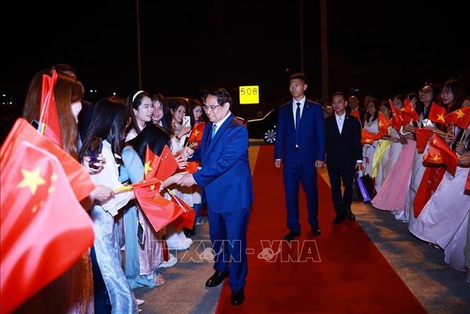 Lễ tiễn Thủ tướng Phạm Minh Chính kết thúc chuyến tham dự Hội nghị WEF 16 Thiên Tân và làm việc tại Trung Quốc. Ảnh: Dương Giang-TTXVN