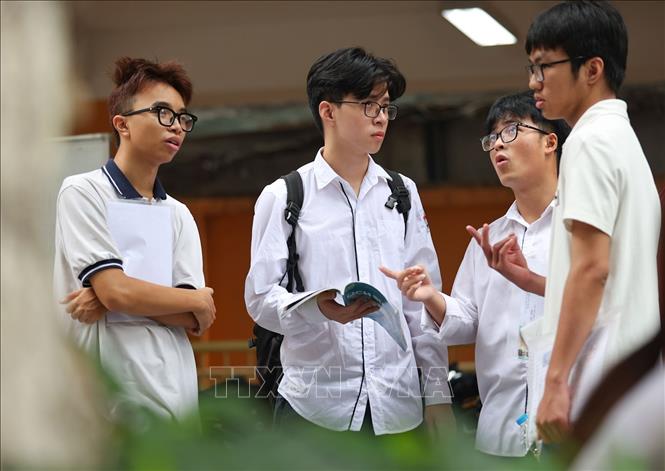 Buổi thi cuối rồi, chúng ta cùng cố gắng. Ảnh: Thanh Tùng - TTXVN