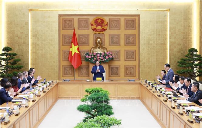 Thủ tướng Phạm Minh Chính chủ trì tọa đàm với các doanh nghiệp Vương quốc Anh. Ảnh: Dương Giang-TTXVN 
