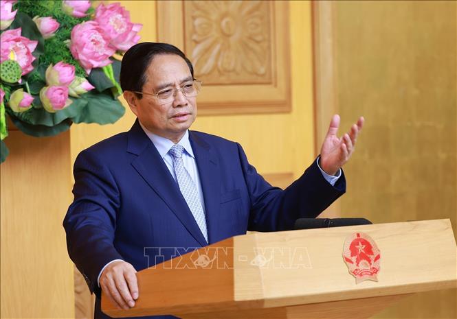 Thủ tướng Phạm Minh Chính phát biểu tại cuộc Tọa đàm với các doanh nghiệp Vương quốc Anh. Ảnh: Dương Giang-TTXVN