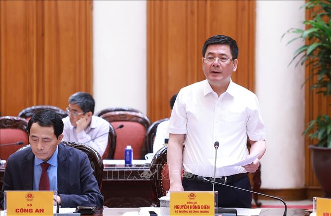 Bộ trưởng Bộ Công Thương Nguyễn Hồng Diên phát biểu. Ảnh: Dương Giang-TTXVN 
