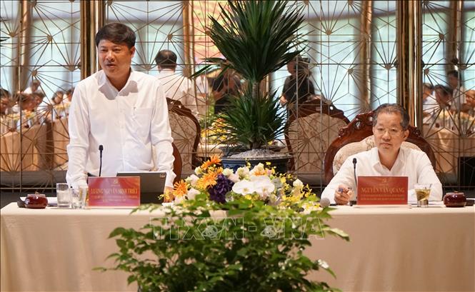 Bí thư Thành ủy Đà Nẵng Nguyễn Văn Quảng (bên phải) và Bí thư Tỉnh ủy Quảng Nam Lương Nguyễn Minh Triết (bên trái) chủ trì Hội nghị. Ảnh: Quốc Dũng - TTXVN