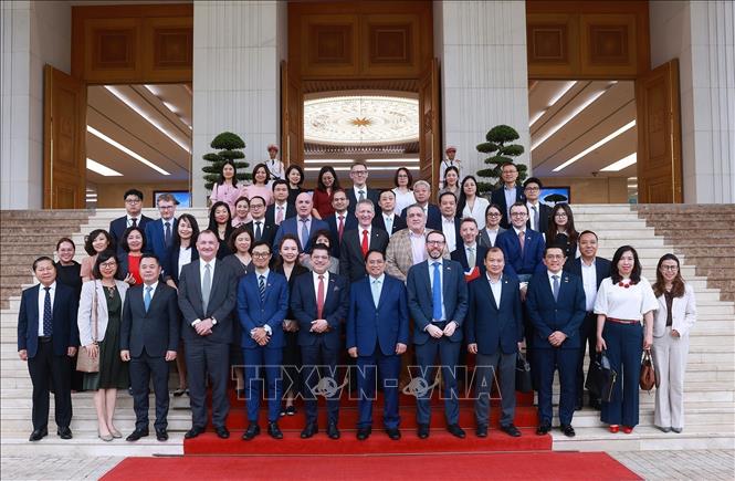 PM Pham Minh Chinh and UK businesses. VNA Photo: Dương Giang