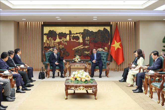 Thủ tướng Phạm Minh Chính tiếp ông Tadashi Maeda, Chủ tịch HĐQT Ngân hàng Hợp tác quốc tế Nhật Bản (JBIC). Ảnh: Dương Giang-TTXVN