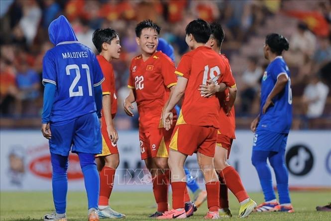 Cầu thủ Mỹ Anh (số 22) ghi bàn thắng nâng tỷ số lên 4-0 cho đội tuyển nữ Việt Nam. Ảnh: Minh Quyết - TTXVN