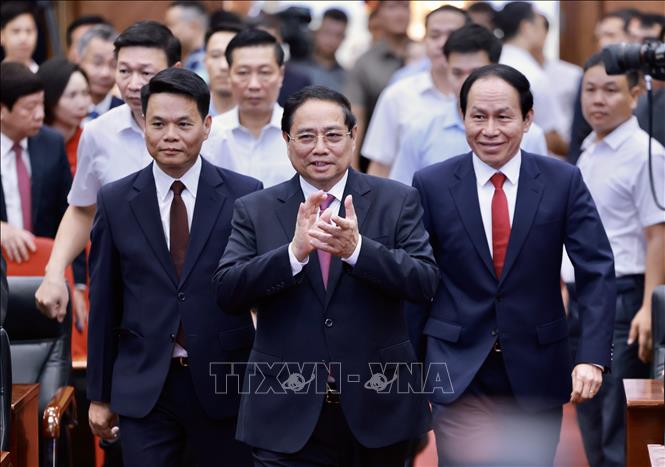 Thủ tướng Phạm Minh Chính đến dự Lễ công bố các nghị quyết, quyết định của Trung ương về sáp nhập đơn vị hành chính cho thành phố Hải Phòng. Ảnh: Dương Giang-TTXVN
