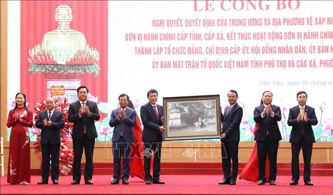 Đại tướng Lương Tam Quang, Bộ trưởng Bộ Công an dự lễ công bố. Ảnh: Tạ Toàn – TTXVN