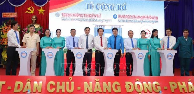 Đồng loạt 36 xã, phường mới trên địa bàn tỉnh Bình Dương đã đổi tên, biển hiệu và công bố sáp nhập. Ảnh: Huyền Trang - TTXVN