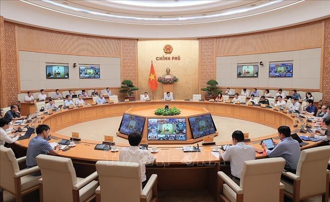 Deputy Prime Minister Nguyen Chi Dung chairs a meeting to review the progress and outcomes of interconnected and synchronised digital transformation in preparation for the scheme on June 30. VNA Photo: An Đăng