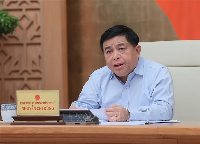 Deputy Prime Minister Nguyen Chi Dung chairs a meeting to review the progress and outcomes of interconnected and synchronised digital transformation in preparation for the scheme on June 30. VNA Photo: An Đăng