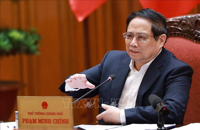 Thủ tướng Phạm Minh Chính, Bí thư Đảng uỷ Chính phủ chủ trì cuộc họp. Ảnh: Dương Giang-TTXVN
