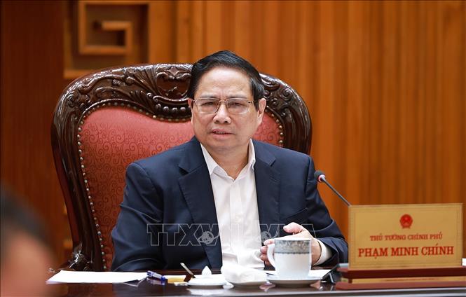 Thủ tướng Phạm Minh Chính, Bí thư Đảng uỷ Chính phủ chủ trì cuộc họp. Ảnh: Dương Giang-TTXVN
