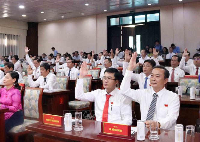 Đại biểu HĐND Thành phố Hồ Chí Minh biểu quyết thông qua Nghị quyết tại Kỳ họp thứ nhất. Ảnh: Xuân Khu-TTXVN