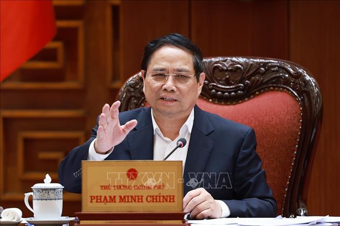 Thủ tướng Phạm Minh Chính chủ trì cuộc họp cho ý kiến vào dự thảo Luật Quy hoạch trình Bộ Chính trị. Ảnh: Dương Giang-TTXVN
