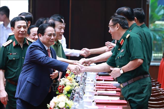 Thủ tướng Phạm Minh Chính đến dự Hội nghị quân chính toàn quân 6 tháng đầu năm 2025. Ảnh: Dương Giang-TTXVN
