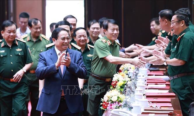 Thủ tướng Phạm Minh Chính đến dự Hội nghị quân chính toàn quân 6 tháng đầu năm 2025. Ảnh: Dương Giang-TTXVN
