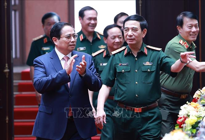 Thủ tướng Phạm Minh Chính đến dự Hội nghị quân chính toàn quân 6 tháng đầu năm 2025. Ảnh: Dương Giang-TTXVN

