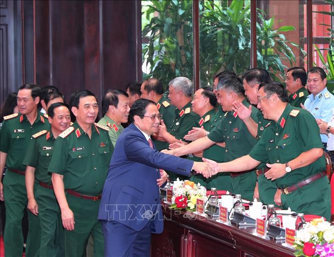Thủ tướng Phạm Minh Chính với các đại biểu tại Hội nghị Quân chính toàn quân 6 tháng đầu năm 2025. Ảnh: Trọng Đức - TTXVN