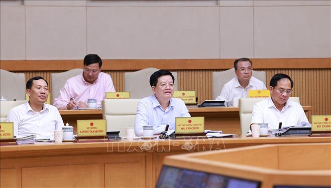 Các Phó Thủ tướng và thành viên Chính phủ tham dự phiên họp. Ảnh: Dương Giang-TTXVN