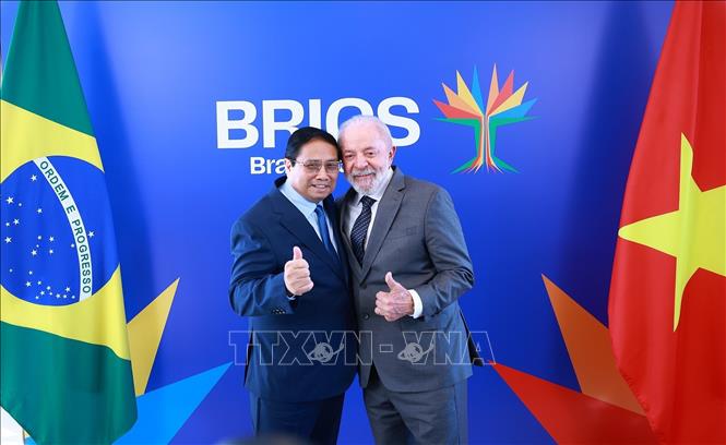 Thủ tướng Phạm Minh Chính và Tổng thống Cộng hòa Liên bang Brazil Lula da Silva. Ảnh: Dương Giang-TTXVN
