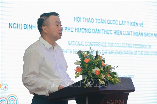 Thứ trưởng Bộ Tài chính Nguyễn Đức Chi phát biểu tại Hội thảo. Ảnh: Lê Đông - TTXVN
