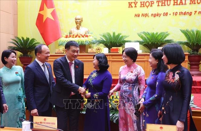 Các đại biểu trao đổi bên lề Kỳ họp. Ảnh: Văn Điệp - TTXVN