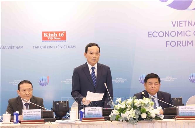 Secretary of the Party Central Committee and Chairman of its Commission for Policies and Strategies Tran Luu Quang speaks at the event. VNA Photo: Phương Hoa