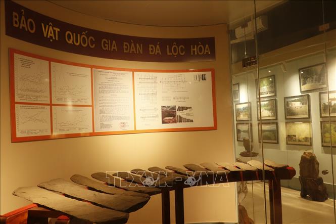 Bảo vật quốc gia bộ đàn đá Lộc Hòa được phát hiện vào năm 1996 bởi một người dân khi canh tác vườn nhà. Ảnh: K GỬIH -TTXVN
