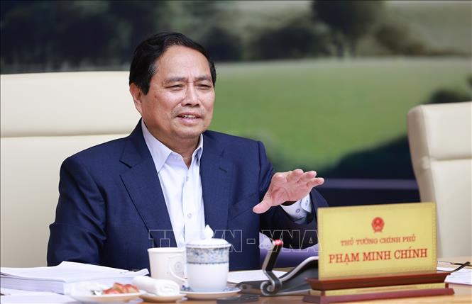 Thủ tướng Phạm Minh Chính chủ trì Phiên họp thứ ba của BCĐ các công trình trọng điểm, dự án quan trọng quốc gia lĩnh vực đường sắt. Ảnh: Dương Giang-TTXVN 