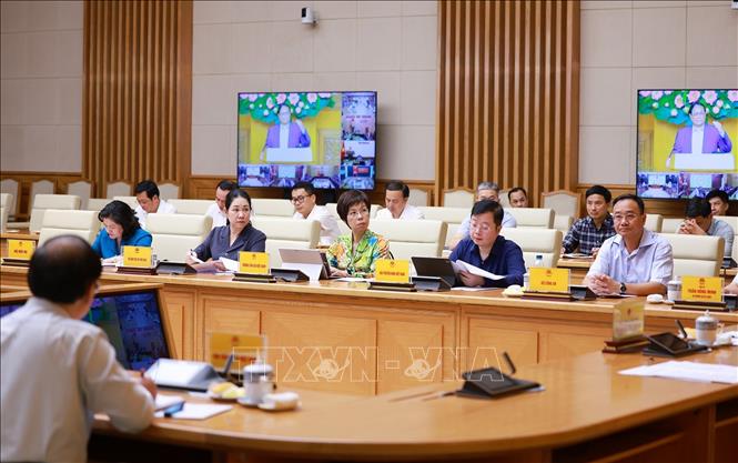 Các đại biểu tham dự Phiên họp thứ 6 của BCĐ xoá nhà tạm, nhà dột nát. Ảnh: Dương Giang-TTXVN 
