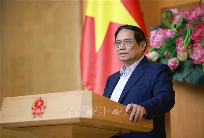 Thủ tướng Phạm Minh Chính chủ trì Phiên họp thứ 6 của BCĐ xoá nhà tạm, nhà dột nát. Ảnh: Dương Giang-TTXVN 
