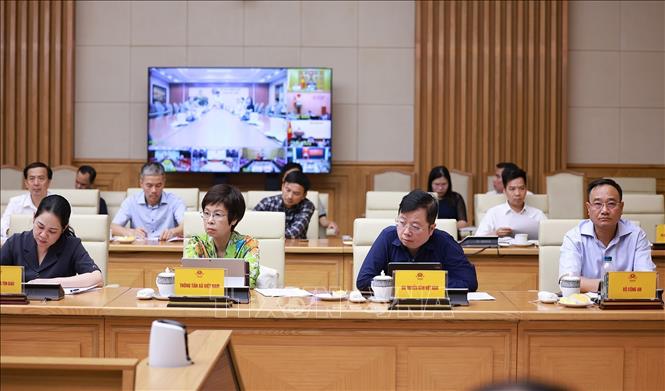 Các đại biểu tham dự Phiên họp thứ 6 của BCĐ xoá nhà tạm, nhà dột nát. Ảnh: Dương Giang-TTXVN 
