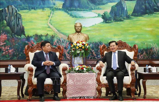 Tổng Bí thư, Chủ tịch nước Lào Thongloun Sisoulith tiếp Phó Thủ tướng Nguyễn Chí Dũng. Ảnh: Xuân Tú - PV TTXVN tại Lào