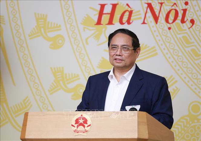 Thủ tướng Phạm Minh Chính chủ trì Hội nghị đánh giá 03 năm thực hiện Nghị quyết số 18-NQ/TW và 01 năm thi hành Luật Đất đai năm 2024. Ảnh: Dương Giang-TTXVN 
