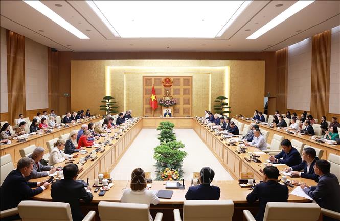 Thủ tướng Phạm Minh Chính làm việc với Đoàn Hội đồng kinh doanh Hoa Kỳ - ASEAN. Ảnh: Dương Giang-TTXVN
