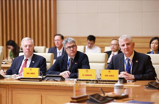 Đoàn Hội đồng kinh doanh Hoa Kỳ - ASEAN (USABC) tham dự buổi làm việc. Ảnh: Dương Giang-TTXVN
