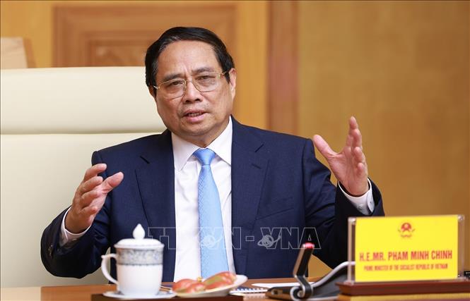 Thủ tướng Phạm Minh Chính làm việc với Đoàn Hội đồng kinh doanh Hoa Kỳ - ASEAN. Ảnh: Dương Giang-TTXVN
