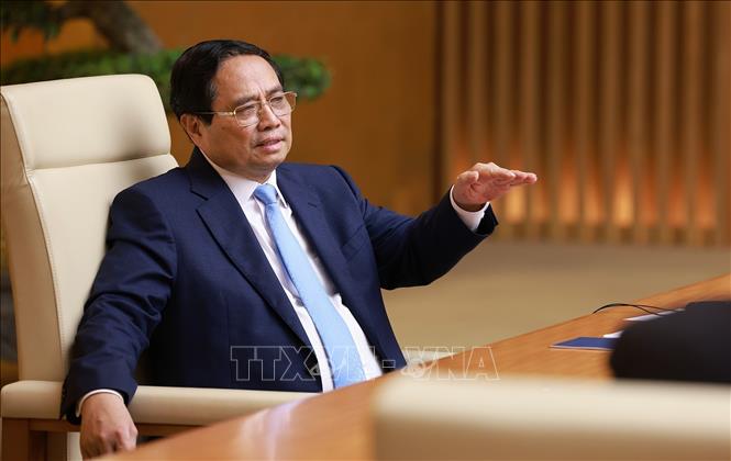 Thủ tướng Phạm Minh Chính làm việc với Đoàn Hội đồng kinh doanh Hoa Kỳ - ASEAN. Ảnh: Dương Giang-TTXVN

