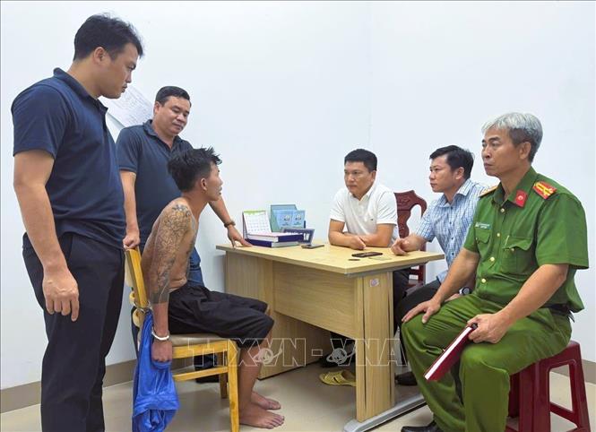  Đối tượng Hoàng Thành Công tại cơ quan điều tra. Ảnh: TTXVN phát
