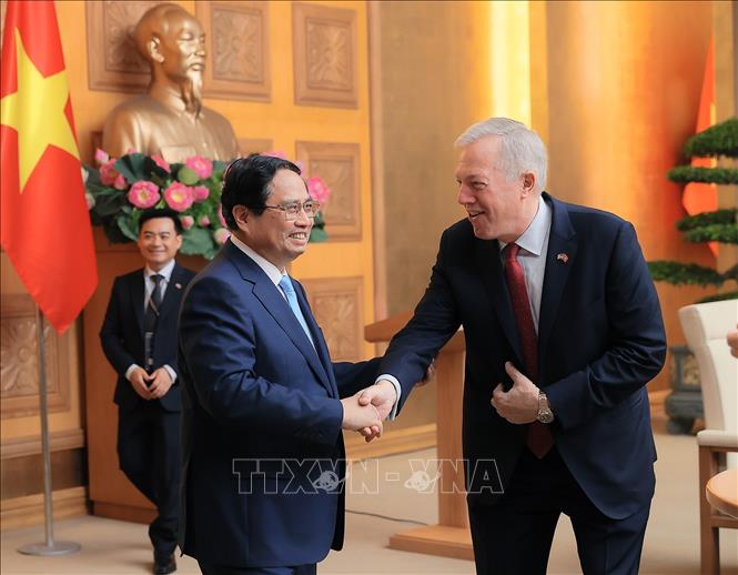 Thủ tướng Phạm Minh Chính với Đoàn Hội đồng kinh doanh Hoa Kỳ - ASEAN (USABC). Ảnh: Dương Giang-TTXVN