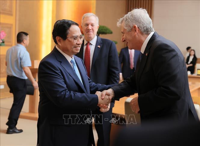 Thủ tướng Phạm Minh Chính với Đoàn Hội đồng kinh doanh Hoa Kỳ - ASEAN (USABC). Ảnh: Dương Giang-TTXVN