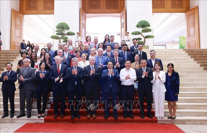 Thủ tướng Phạm Minh Chính với Đoàn Hội đồng kinh doanh Hoa Kỳ - ASEAN (USABC) và một số doanh nghiệp lớn của Hoa Kỳ. Ảnh: Dương Giang-TTXVN