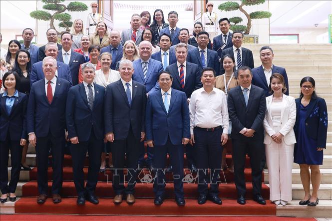 Thủ tướng Phạm Minh Chính với Đoàn Hội đồng kinh doanh Hoa Kỳ - ASEAN (USABC) và một số doanh nghiệp lớn của Hoa Kỳ. Ảnh: Dương Giang-TTXVN