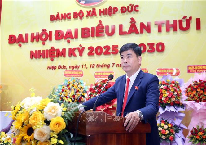 Đồng chí Lê Quang Quỳnh, Bí thư Đảng ủy, Chủ tịch HĐND xã Hiệp Đức phát biểu khai mạc đại hội. Ảnh: Trần Lê Lâm - TTXVN 