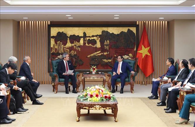 Prime Minister Pham Minh Chinh receives Masayuki Omoto, CEO of Marubeni Corporation, one of Japan’s leading investment and trading conglomerates in Hanoi on July 14. VNA Photo: Dương Giang