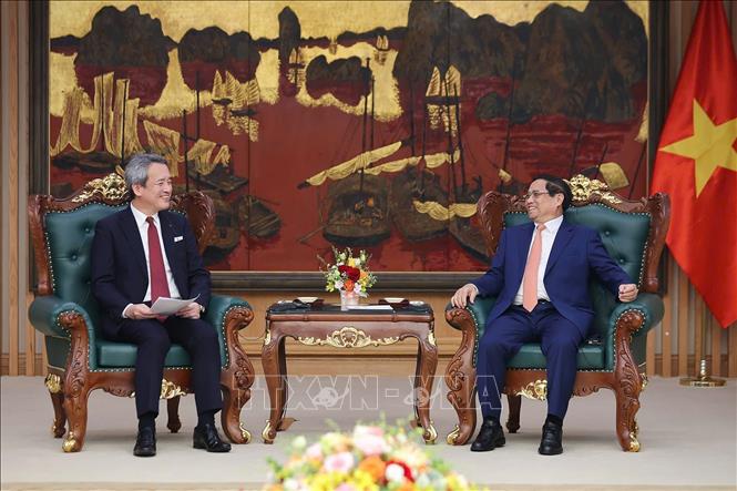 Prime Minister Pham Minh Chinh receives Masayuki Omoto, CEO of Marubeni Corporation, one of Japan’s leading investment and trading conglomerates in Hanoi on July 14. VNA Photo: Dương Giang