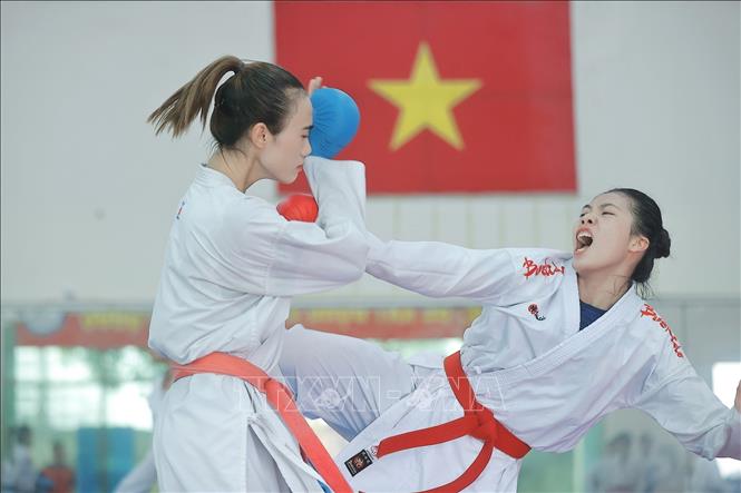 SEA Games là giải đấu quan trọng hàng đầu trong năm 2025, vì đây cũng là thời điểm để đội tuyển chuẩn bị lực lượng tốt nhất hướng tới ASIAD 2026. Nên toàn bộ thành viên đội tuyển đều thận trọng, đánh giá kỹ lưỡng về các đối thủ cạnh tranh trực tiếp trong khu vực, cũng như kiểm tra trình độ các võ sĩ hàng đầu của mình. Ảnh: Minh Quyết – TTXVN